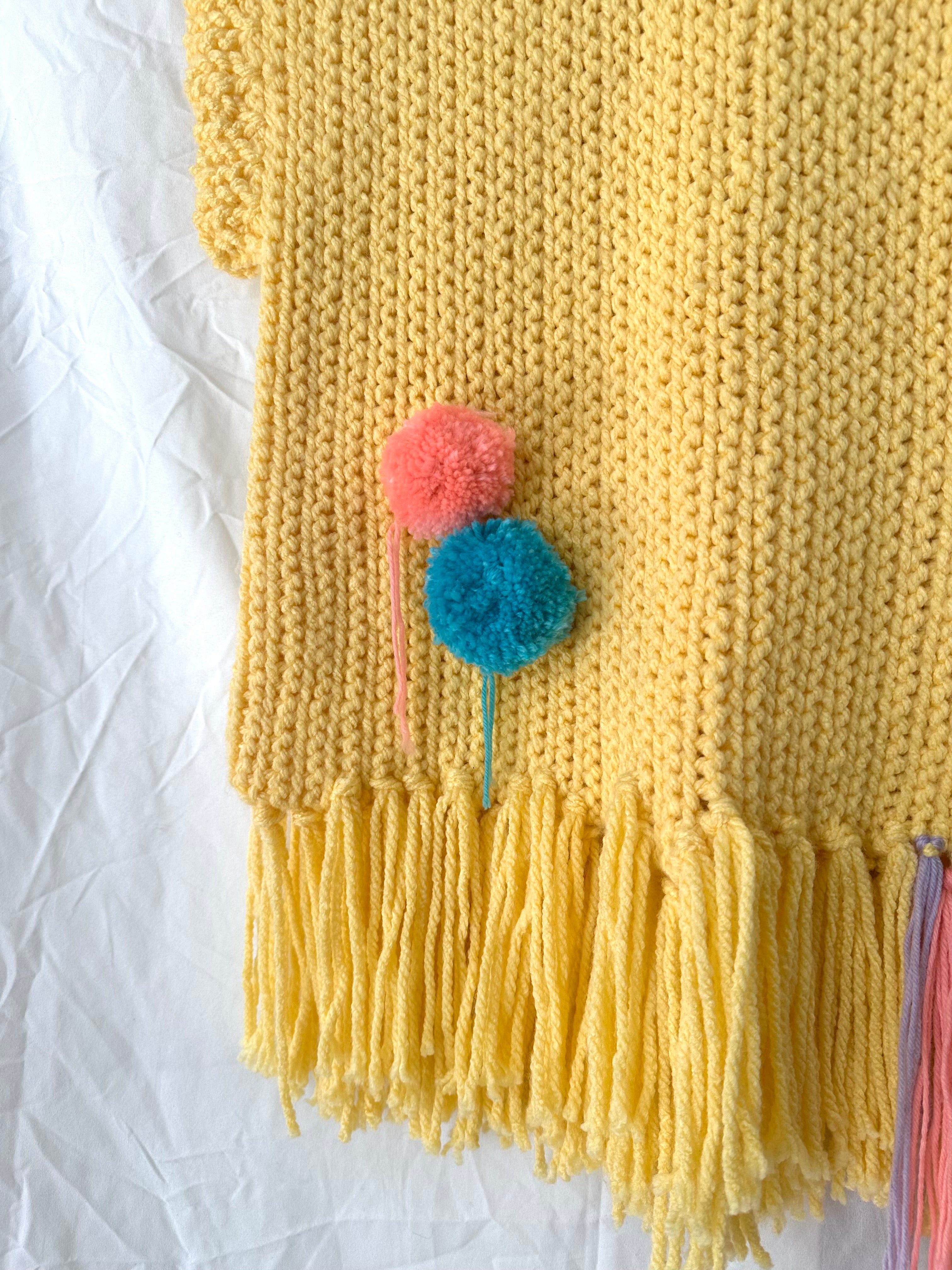 Chaleco crochet pompones