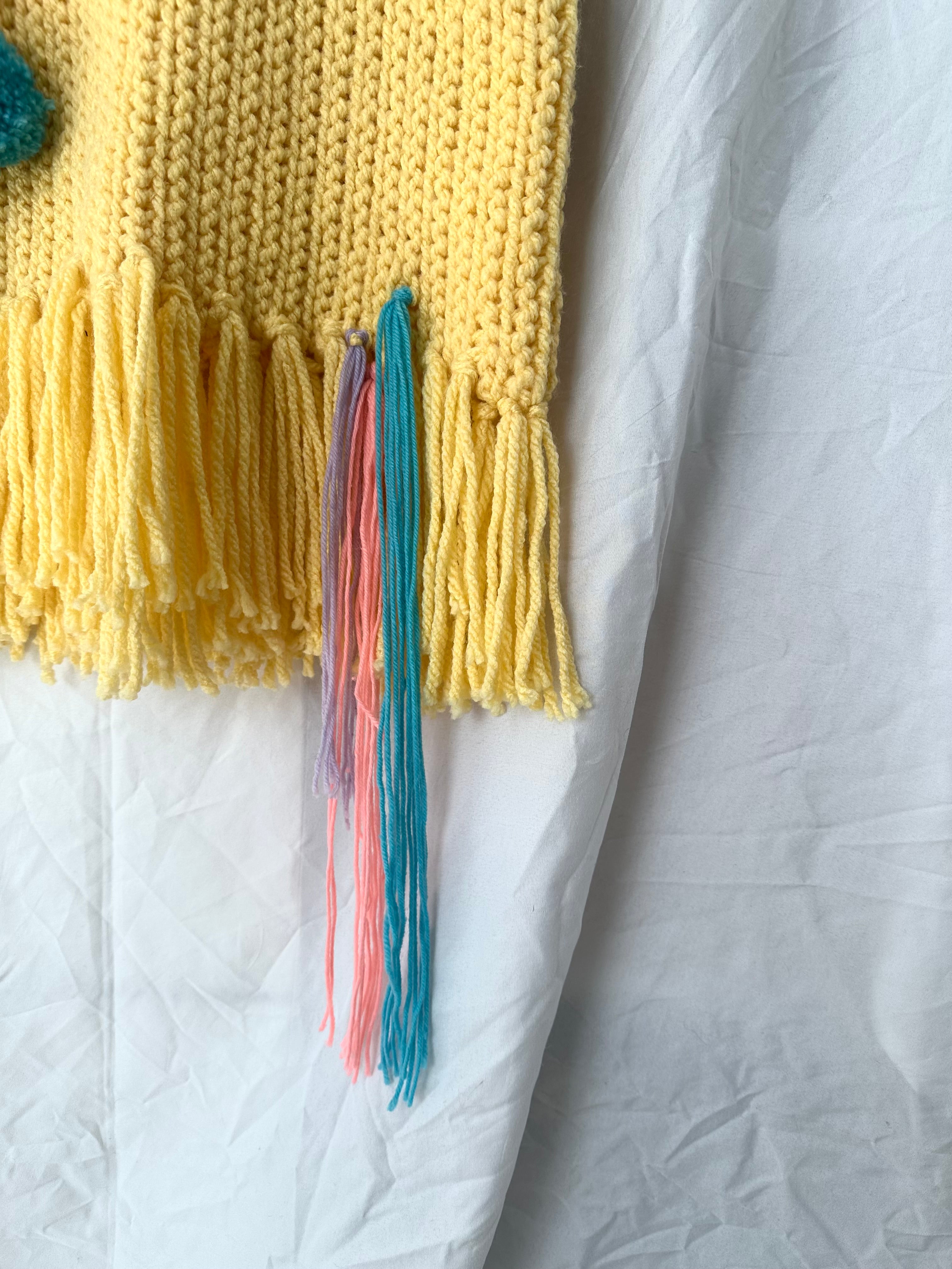 Chaleco crochet pompones